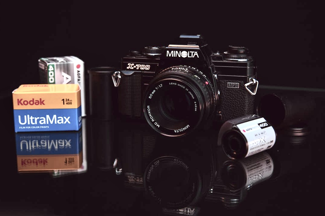 This photo displays a roll of Kodak UltraMax 400 and a Minolta X-700 SLR camera to draw in film photographers into the front page of Brantford Film Lab's home page. This photo has gone viral on all search engines and social media sites and will likely be viewed by many more Ontario Film Photographers from Brantford Ontario, but also Cambridge, Kitchener, Woodstock and London Ontario Canada.